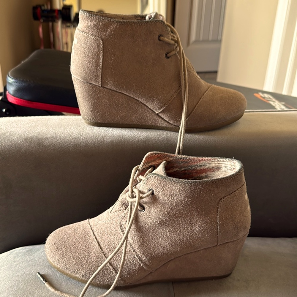 Toms Wedge Bootie. Slight discoloration at top of boots and backs of heels.